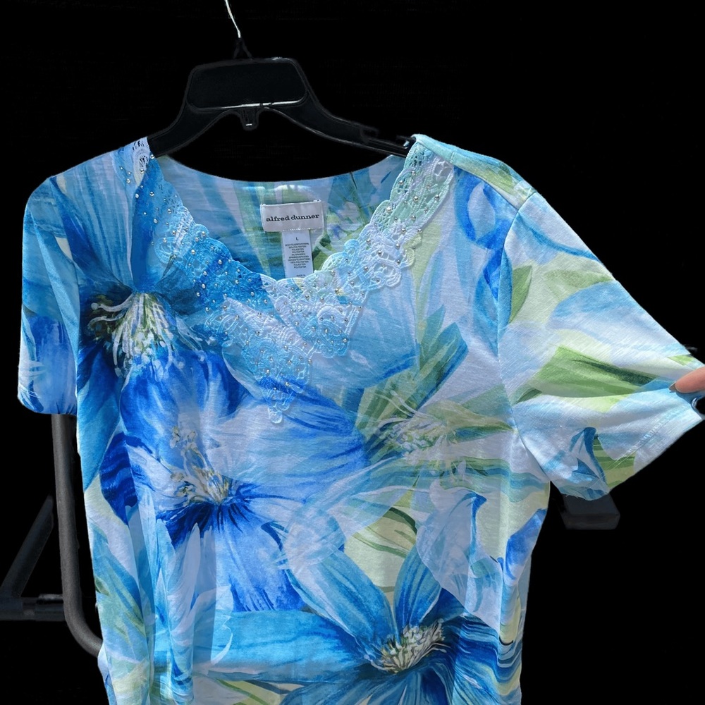 White T-shirt with a blue and green floral print